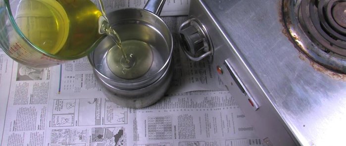 Measure out 14.5 oz of olive oil pomus and pour it into a double boiler. Add 2 tablespoons of Egyptian chamomile in a sealed tea bag to the oil. Steep over medium heat for 2 hours, stirring every 20 minutes. Remove the tea bag.