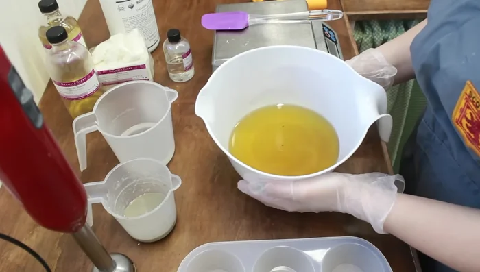 Mix Oils and Lye Water: Heat lye water to 110°F. Slowly pour lye water into the oils, while stirring constantly. 