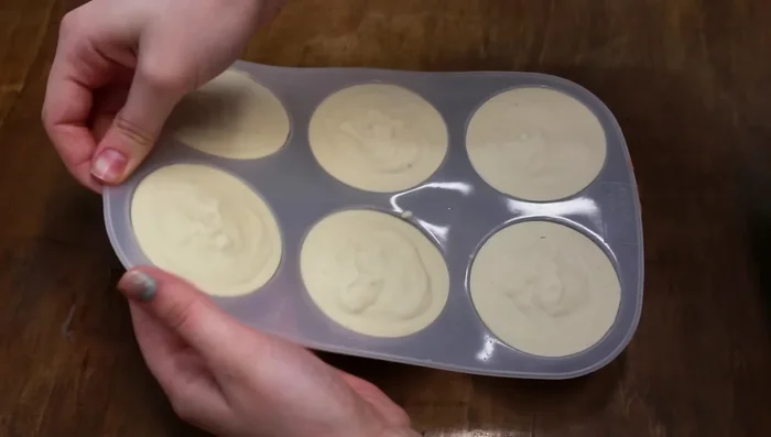 Unmold (after at least 24 hours): Carefully remove the soap from the mold. Let it sit overnight on a paper towel to cure.