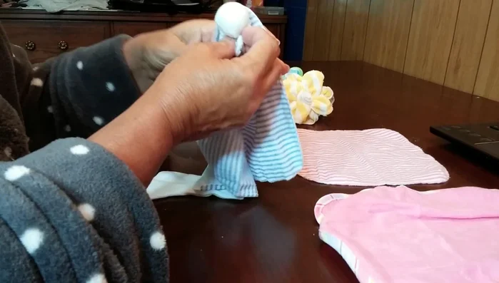 Continue gathering and twisting until you have a gathered ball.