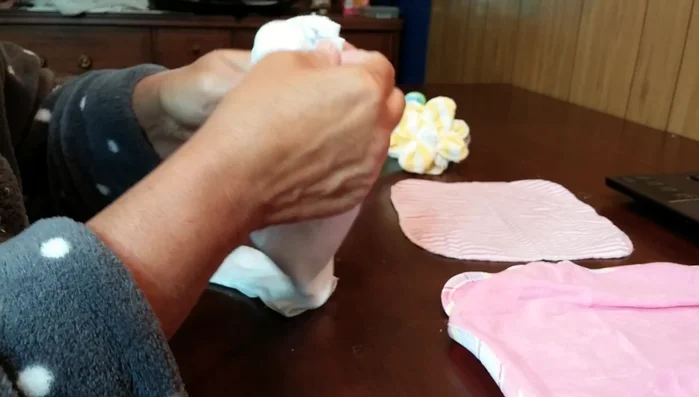 Continue gathering and twisting until you have a gathered ball.