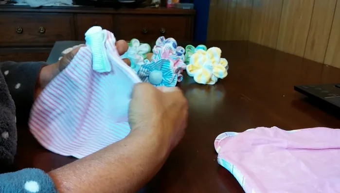 Secure the gathered corners with a rubber band.