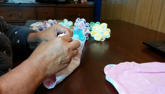 Secure the gathered corners with a rubber band.