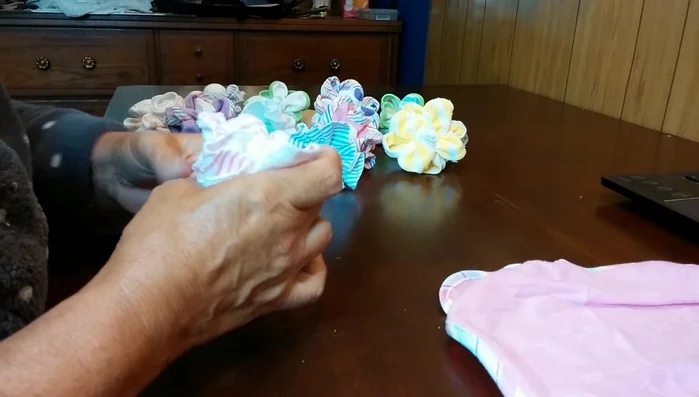 Secure the gathered corners with a rubber band.