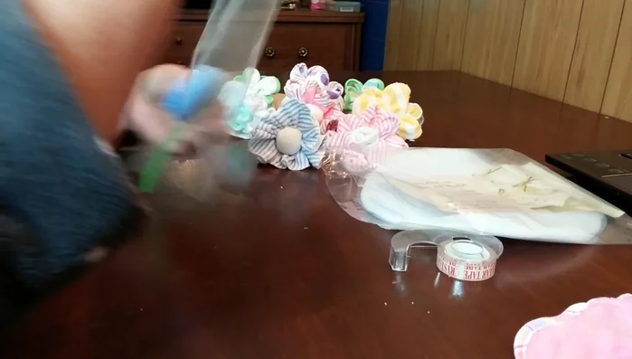 Decorate the base with a tool circle and ribbon.