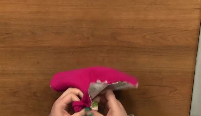 Fold in the raw edges of the opening and press. Stitch the opening closed.