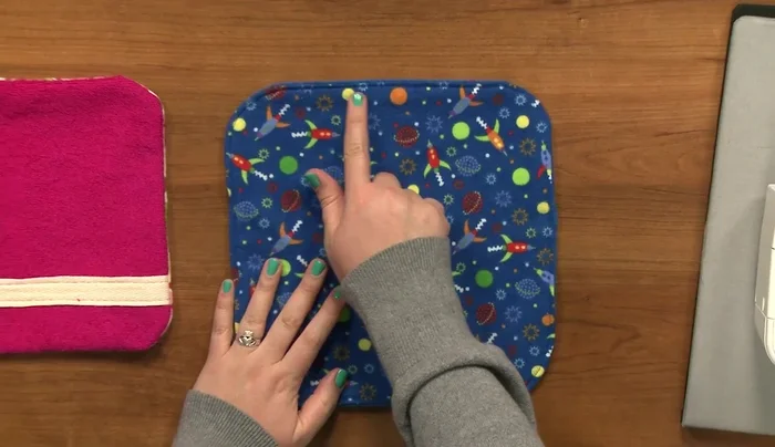 Fold in the raw edges of the opening and press. Stitch the opening closed.