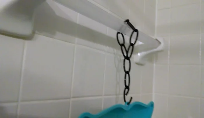Hang the loop over a bathroom towel bar.
