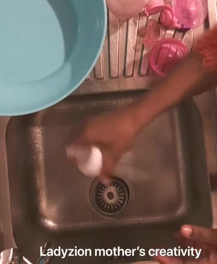 Rinse the feeding bottle and pacifier with warm water to remove any initial residue.