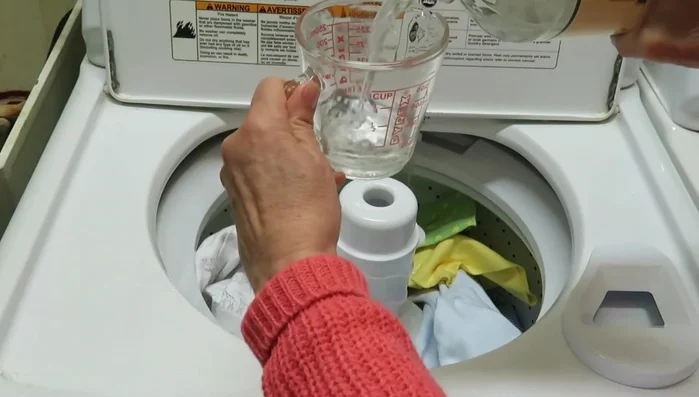 Run the washing machine through a complete cycle.