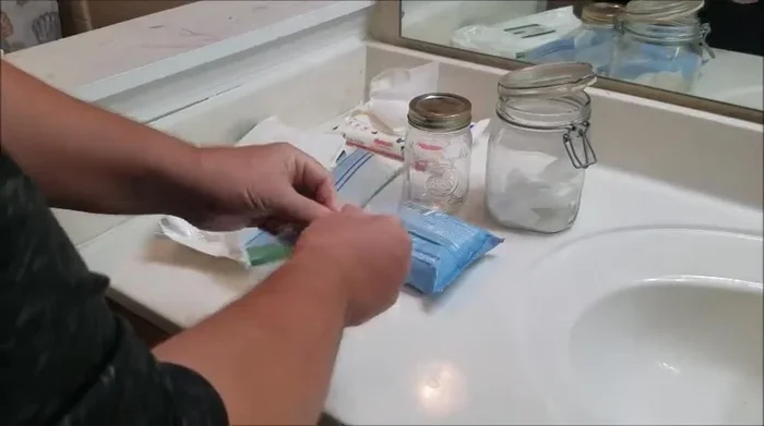 Place the wipes in a resealable sandwich bag.