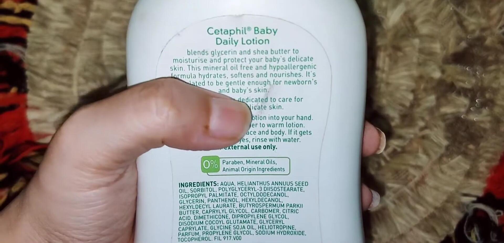 Close-up shot of Cetaphil Baby Lotion bottle highlighting key ingredients