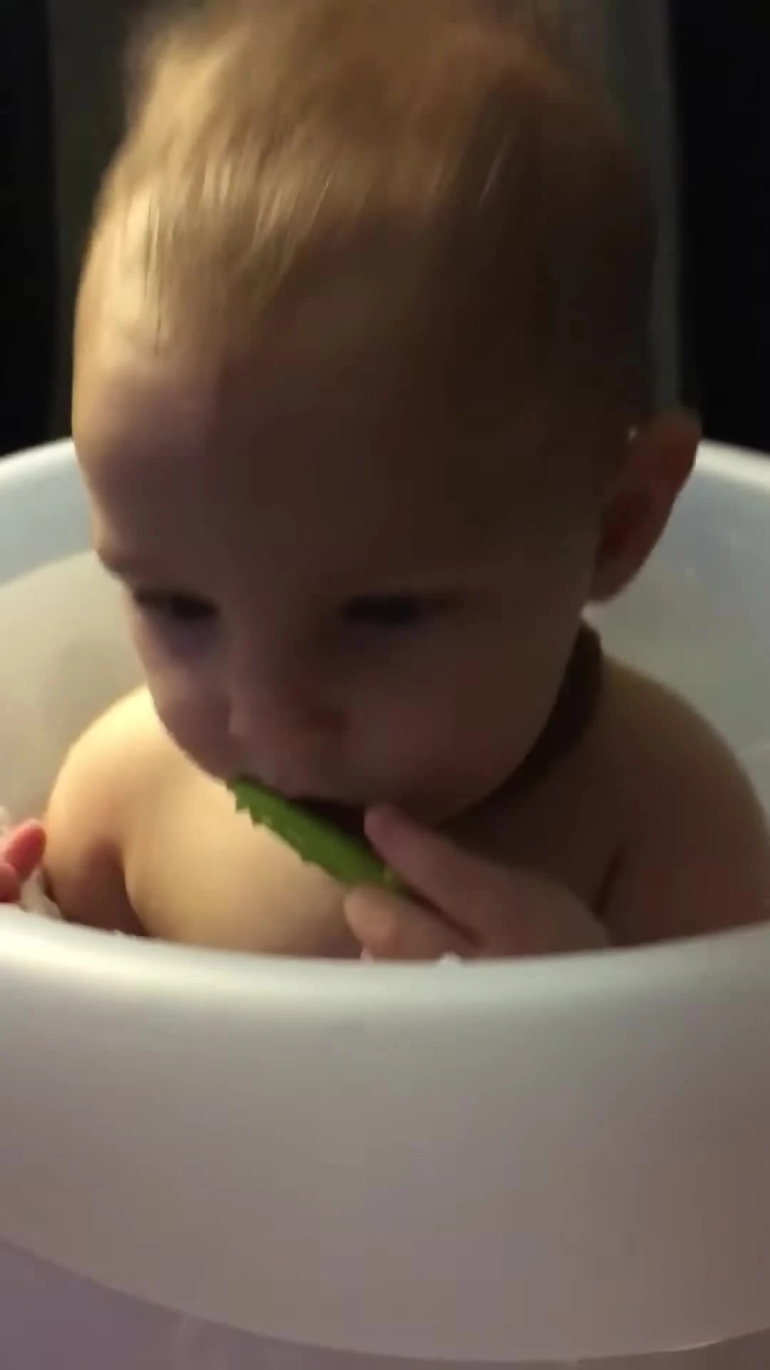 Baby River sitting comfortably in the WashPod.
