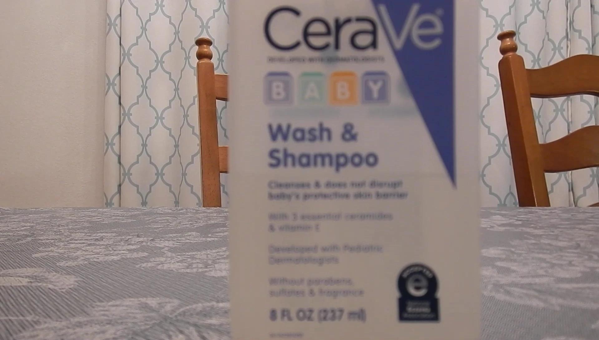 Speaker describing the difficulty in rinsing the shampoo from hair.