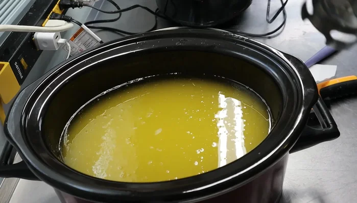 Blend using a stick blender until trace appears.