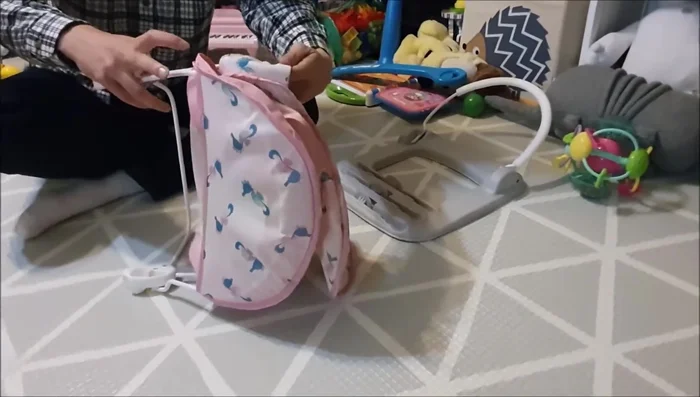 Attach the lower cover to the frame by pushing down and snapping it in.