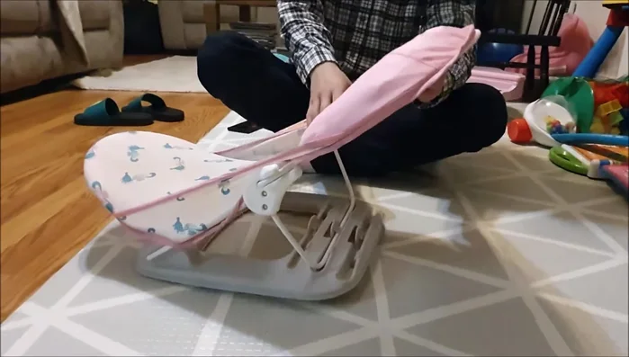 Remove the cover from the frame. Place your thumbs under the frame and push up on both sides simultaneously to release it from the grooves.