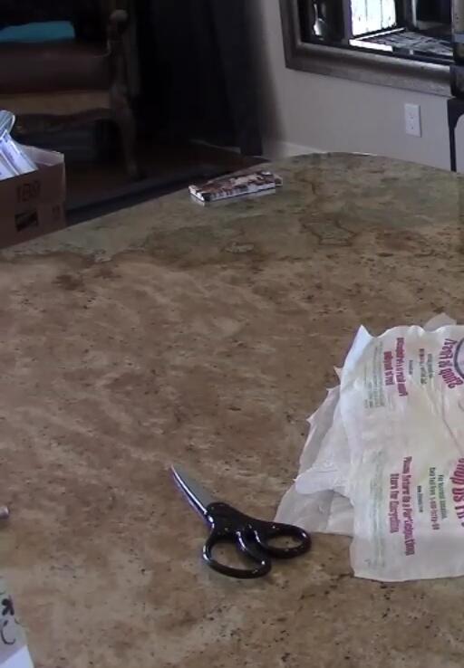 Trimming the edges of the fused plastic
