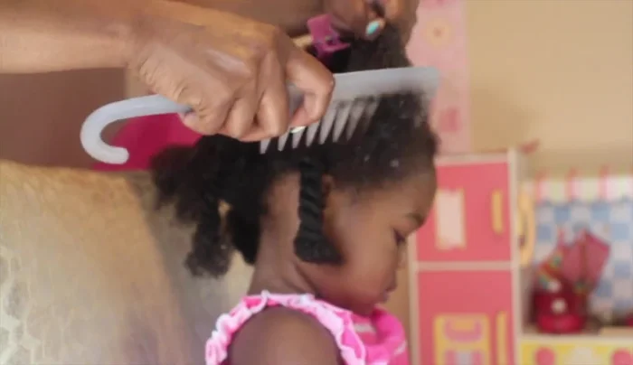 Maintain a firm grip on the hair section you are detangling to minimize pulling and discomfort.