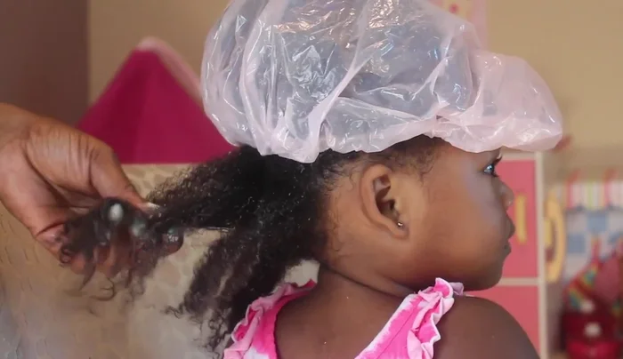 Begin detangling with your fingers. Finger detangling is gentler than using a comb.