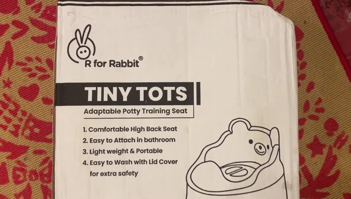 Stating dimensions of the potty: 37cm length, 33cm width, 28cm height.