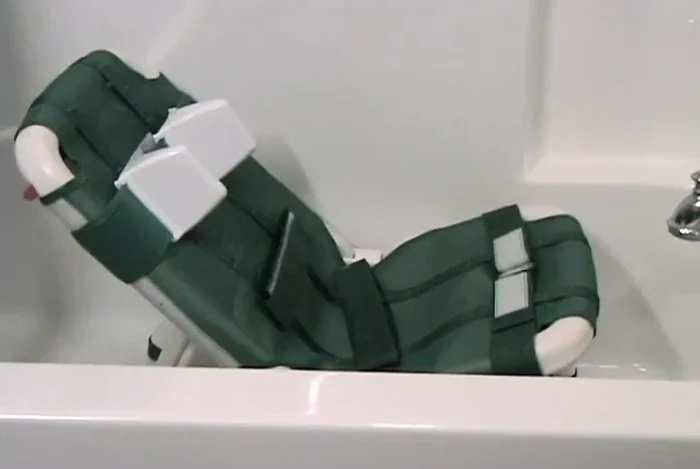 Adjusting the Otter's Head Wedges: Adjust the head wedges to different positions based on the child's needs.