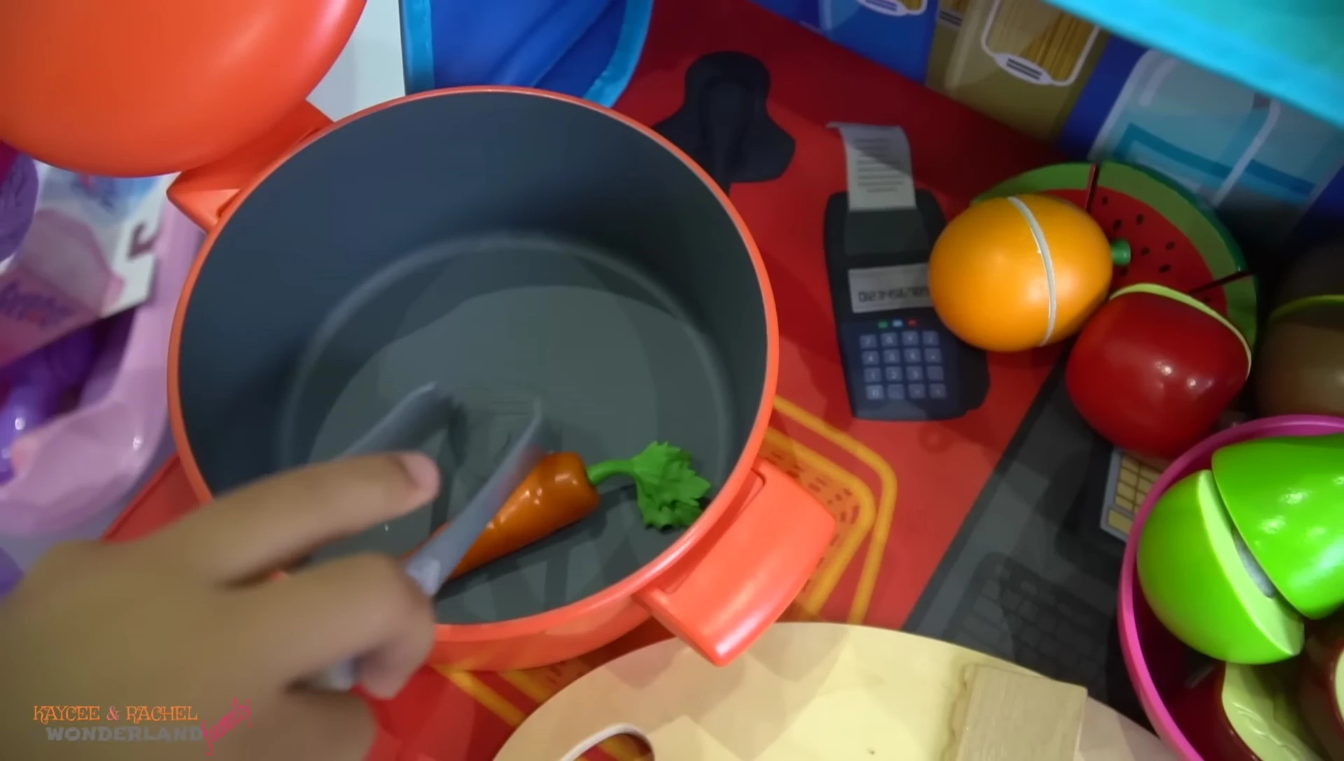 Rachel preparing food for the baby doll.
