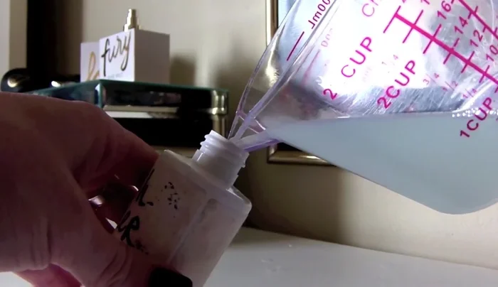 Pour the mixture into a clean spray bottle.