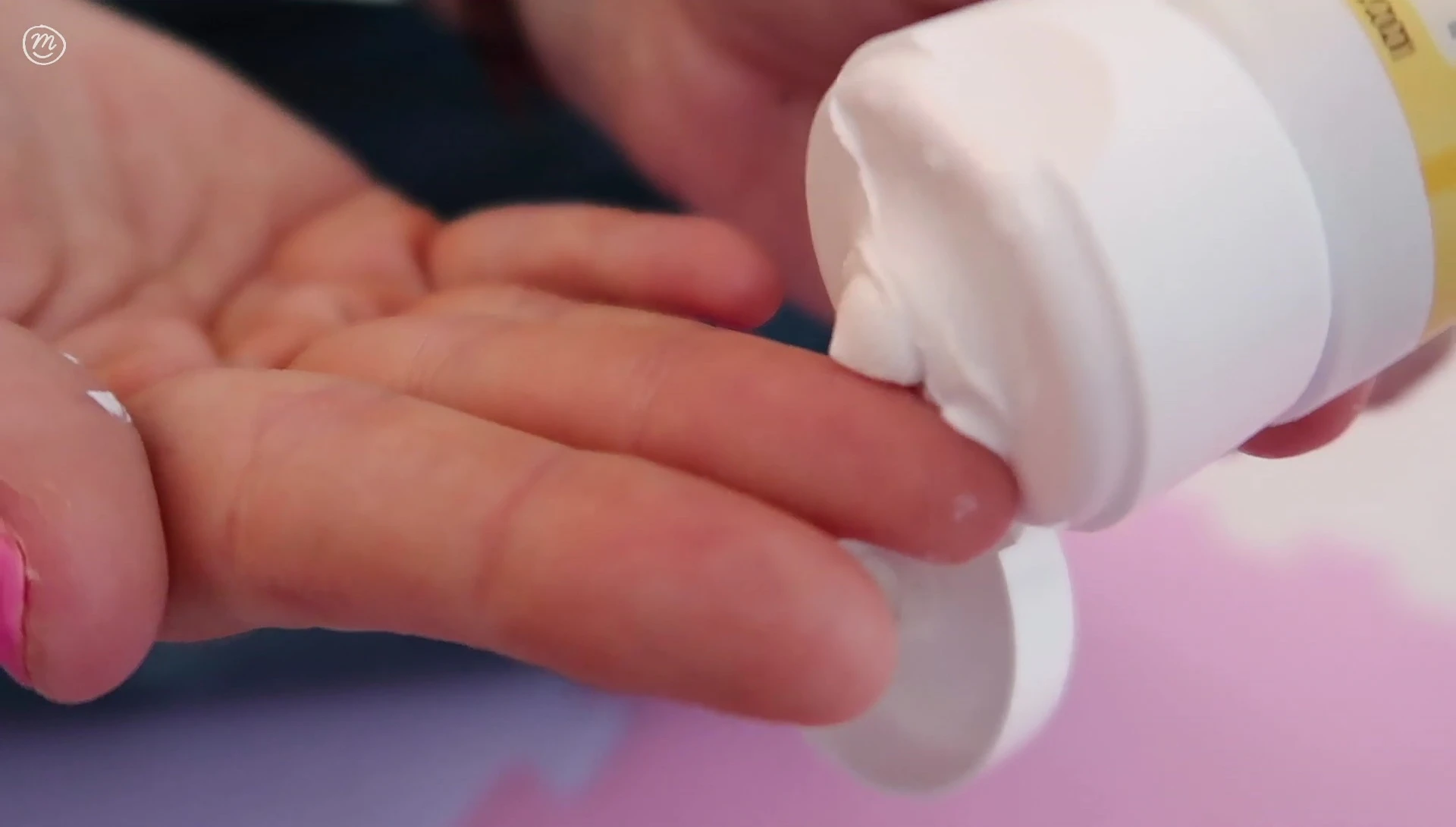 Close-up of Burt's Bees Diaper Cream on baby's bottom