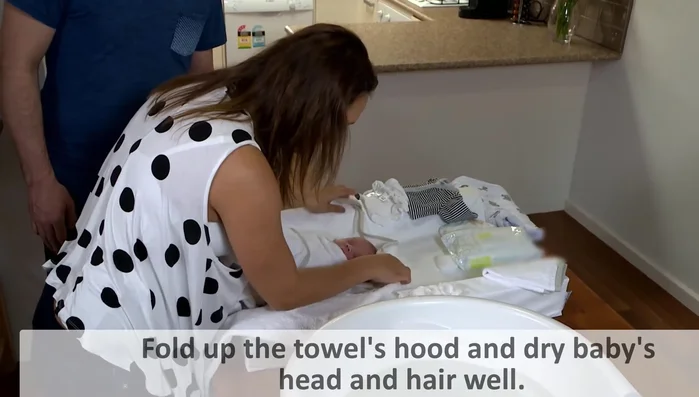 Clean bottom: Clean baby's bottom, using disposable wipes or cotton wool and water (girls: front to back).