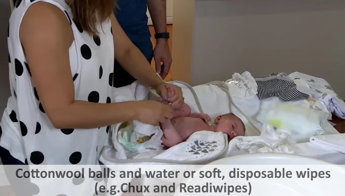 Clean bottom: Clean baby's bottom, using disposable wipes or cotton wool and water (girls: front to back).