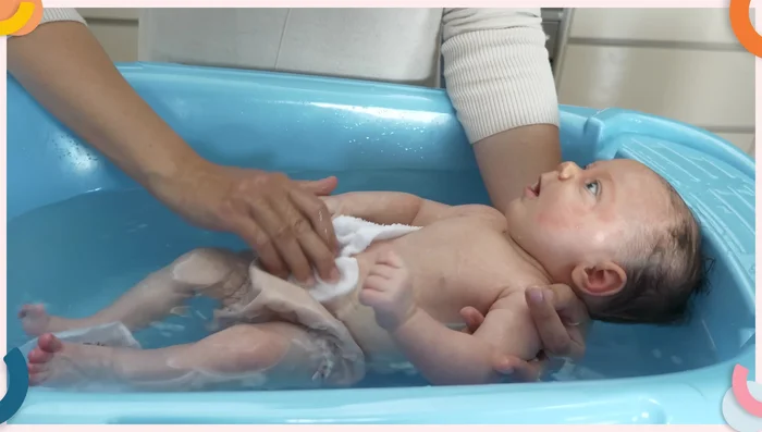 Wash your baby's body, paying close attention to folds and in between fingers and toes.