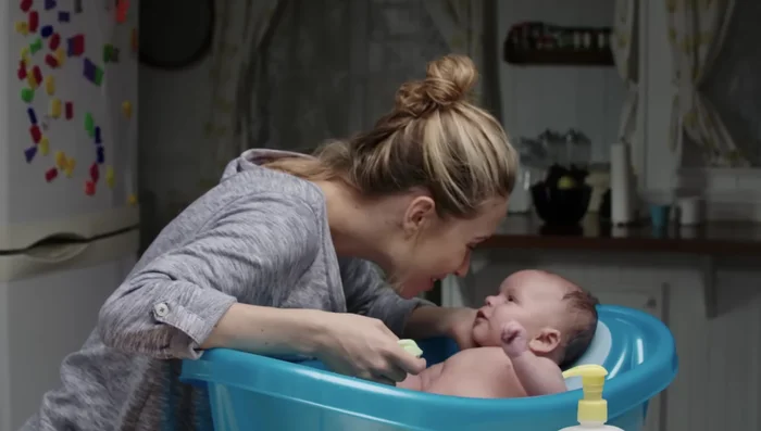 Take a moment to connect and bond with your baby during the bath.