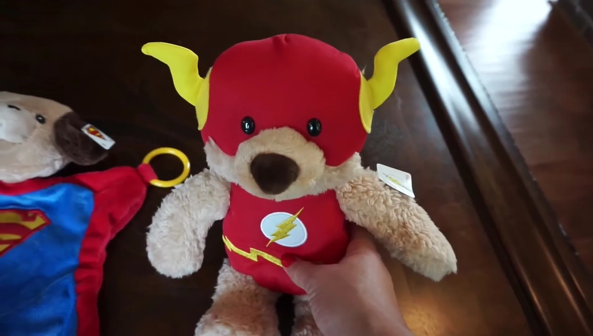 Flash teddy bear and Superman toy