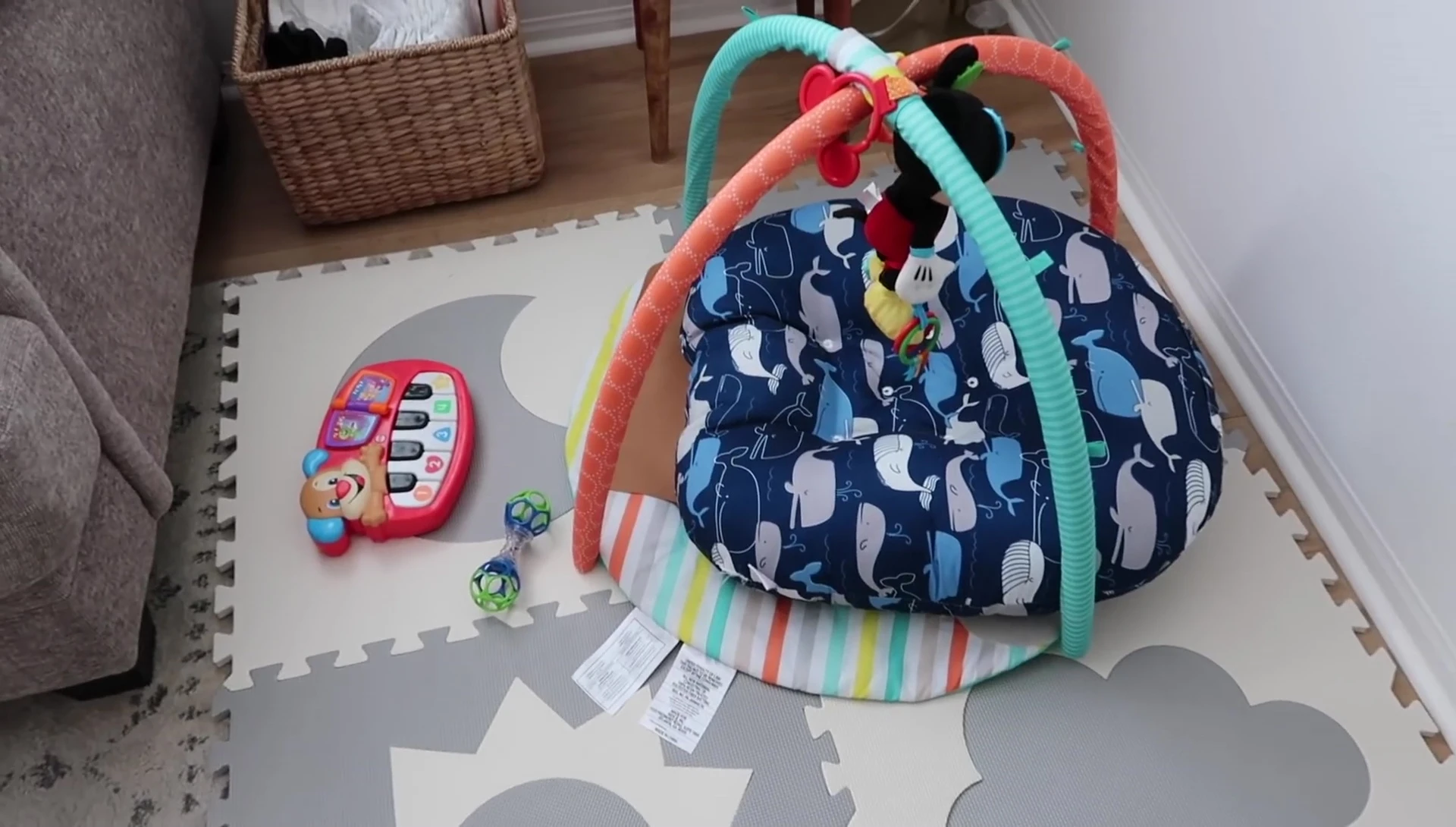 Baby's play area with activity gym.