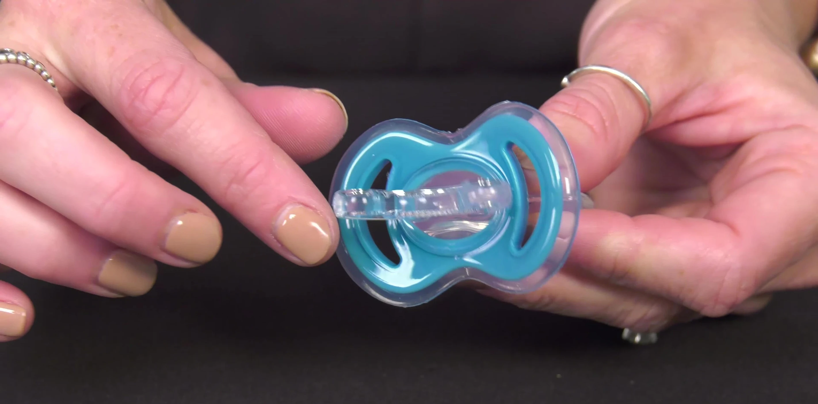 Teether being cleaned