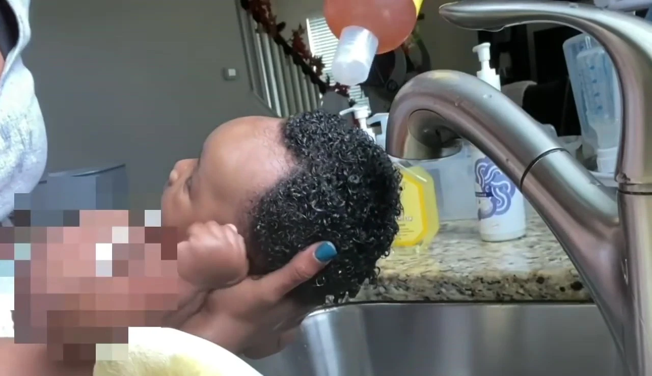 Gentle massage of the scalp with fingertips