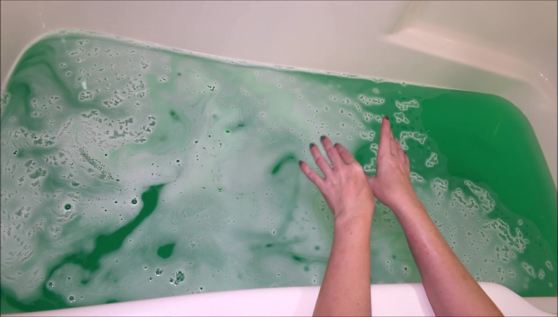 Close-up shot showing the bath water and its texture.