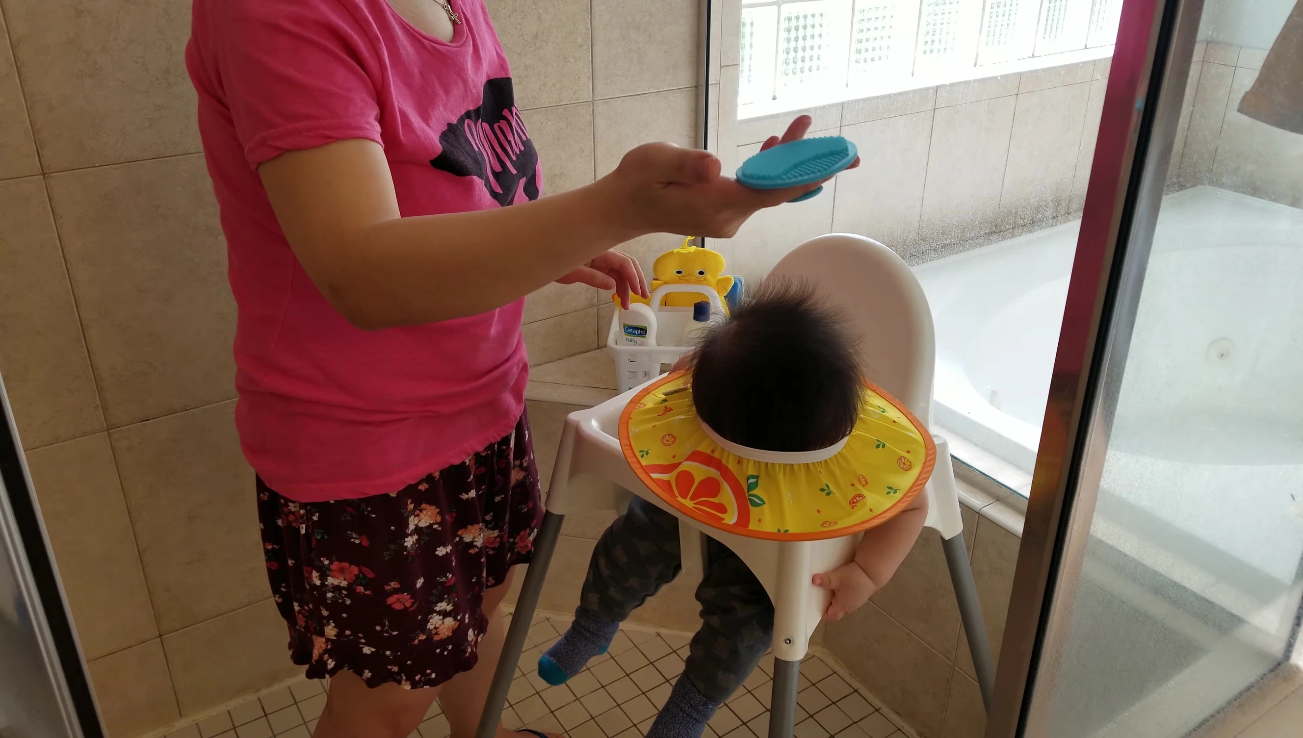 Frida Baby silicone bath brush