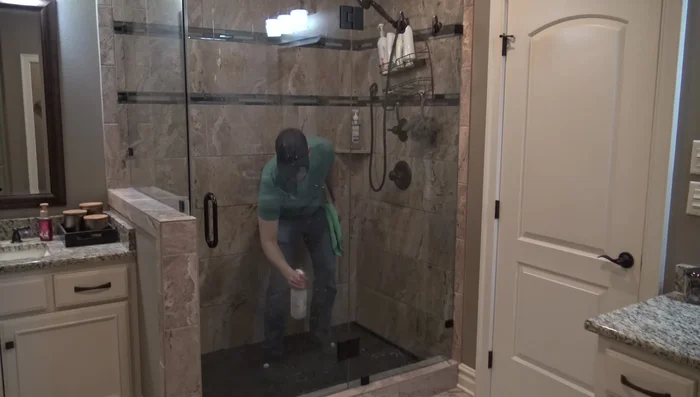 Rinse thoroughly with shower sprayer or cup of water