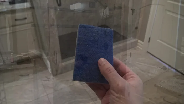 Rinse thoroughly with shower sprayer or cup of water