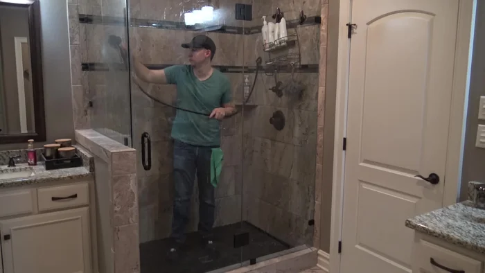 Rinse thoroughly with shower sprayer or cup of water