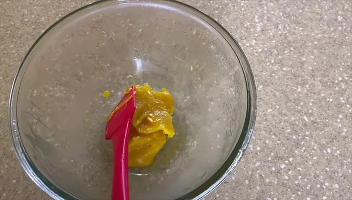 Once firm, use a hand mixer to whip the mixture until light and fluffy, no chunks (this may take some time).