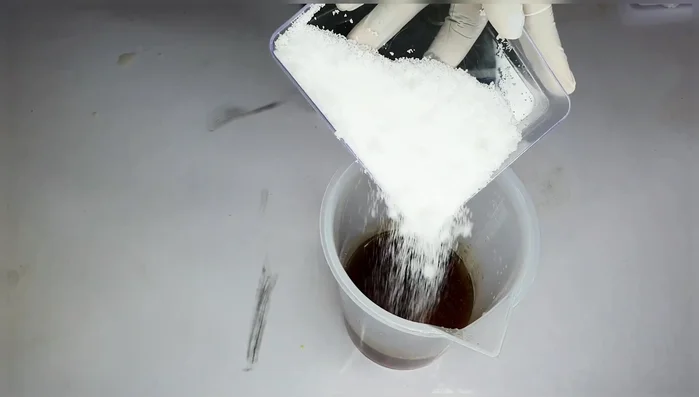 Prepare caustic soda solution using chamomile tea as a diluent.