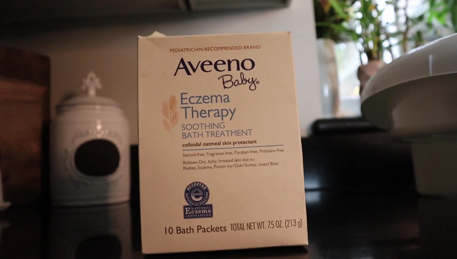 Adding eczema treatment powder to the bath.
