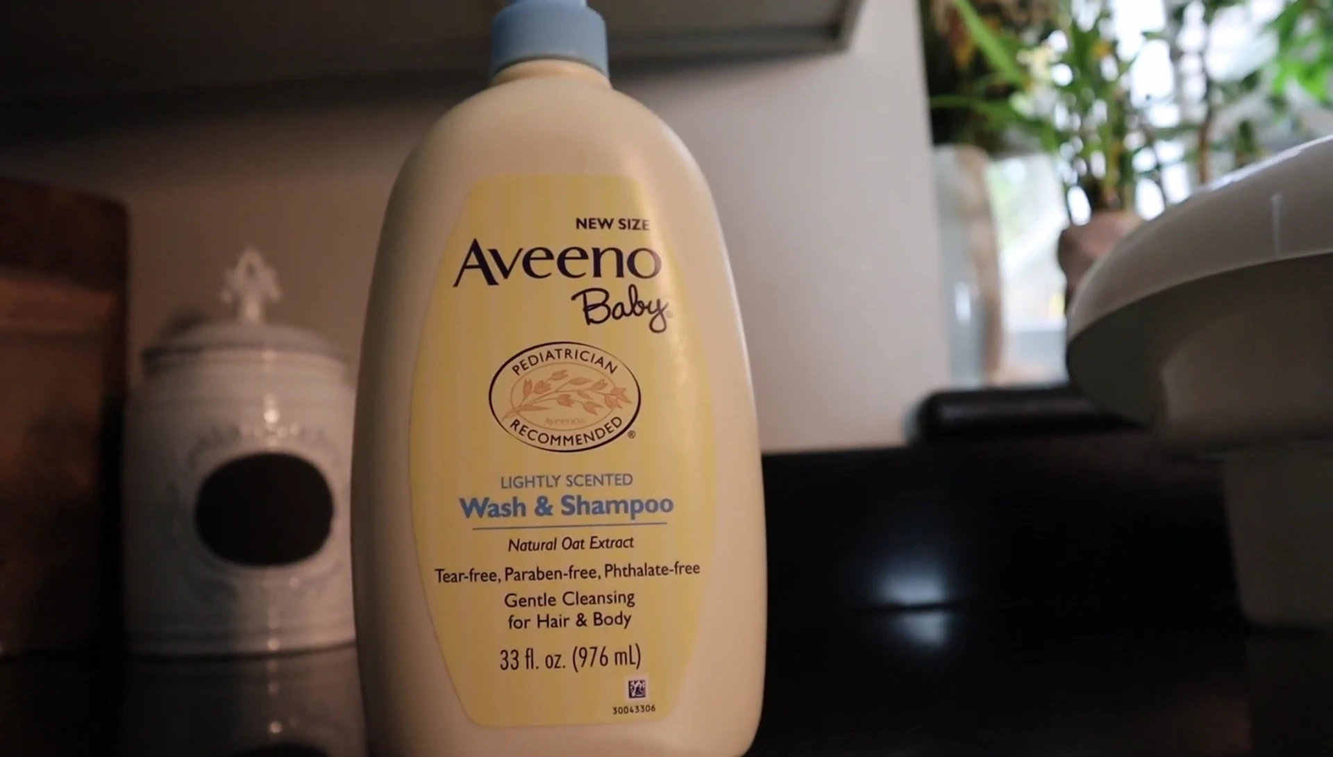 Aveeno Baby Wash & Shampoo bottle.