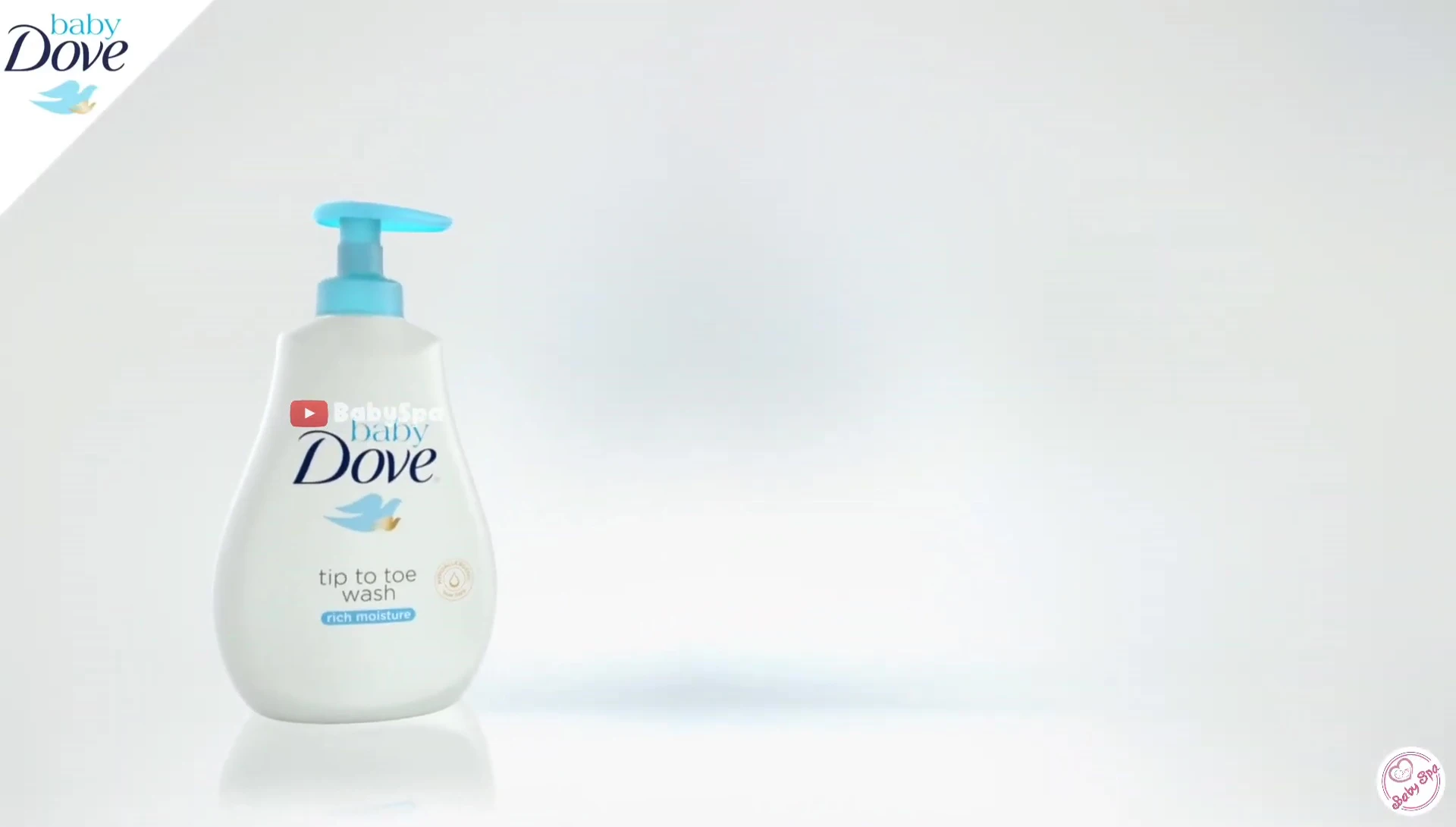 Happy baby after bath with Dove soap