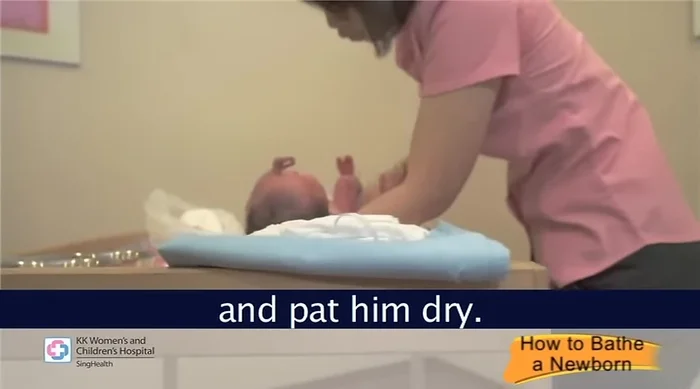 Dress baby: Dress your baby in comfortable clothes appropriate for the environment. Apply baby lotion if desired (powder is not encouraged).