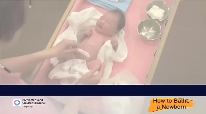 Clean umbilical cord: Wash hands. Use cotton balls dipped in cool boiled water to clean the base of the cord with one circular motion, then clean the sides from base upwards using a new cotton ball each time. Clean the cord clamp and tip.