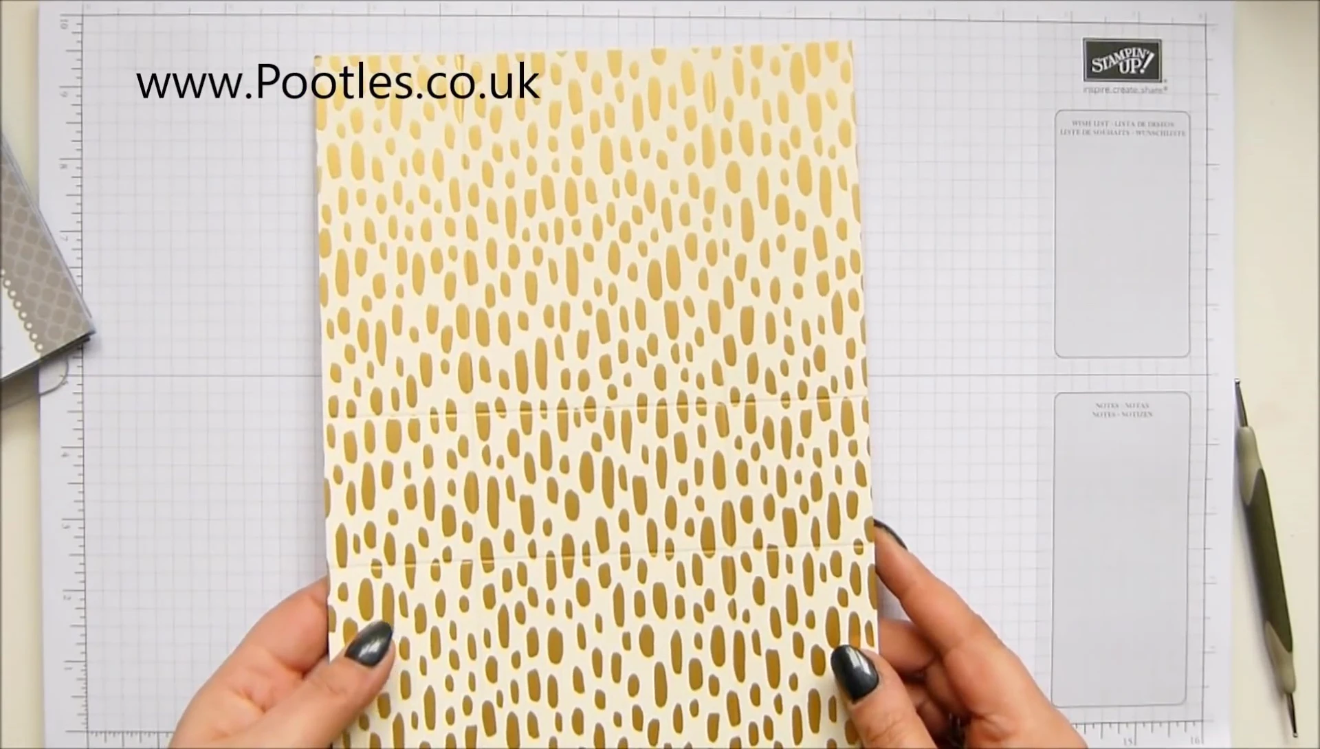 Close-up showing the patterned paper used for the bag.